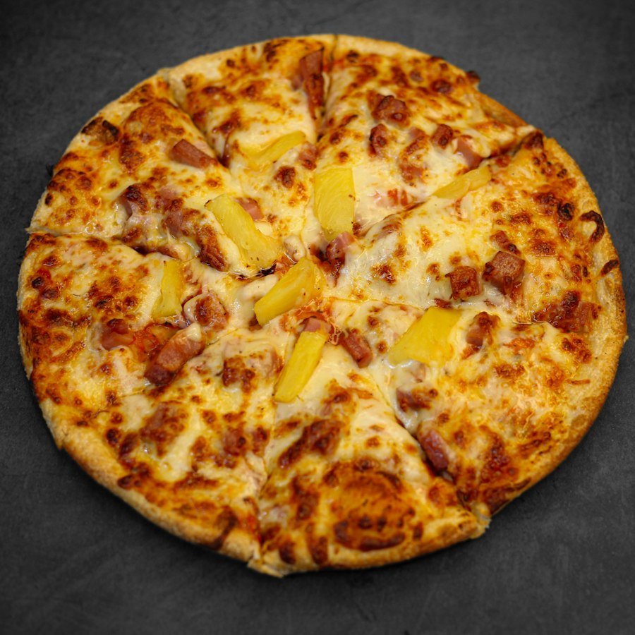 Hasina Pizza Market Deeping with chicken, ham and pineapple from Eastern Promise near Peterborough